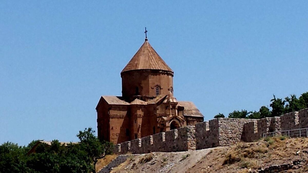 Akdamar Island church on Lake Van, surrounded by blue water and distant mountains