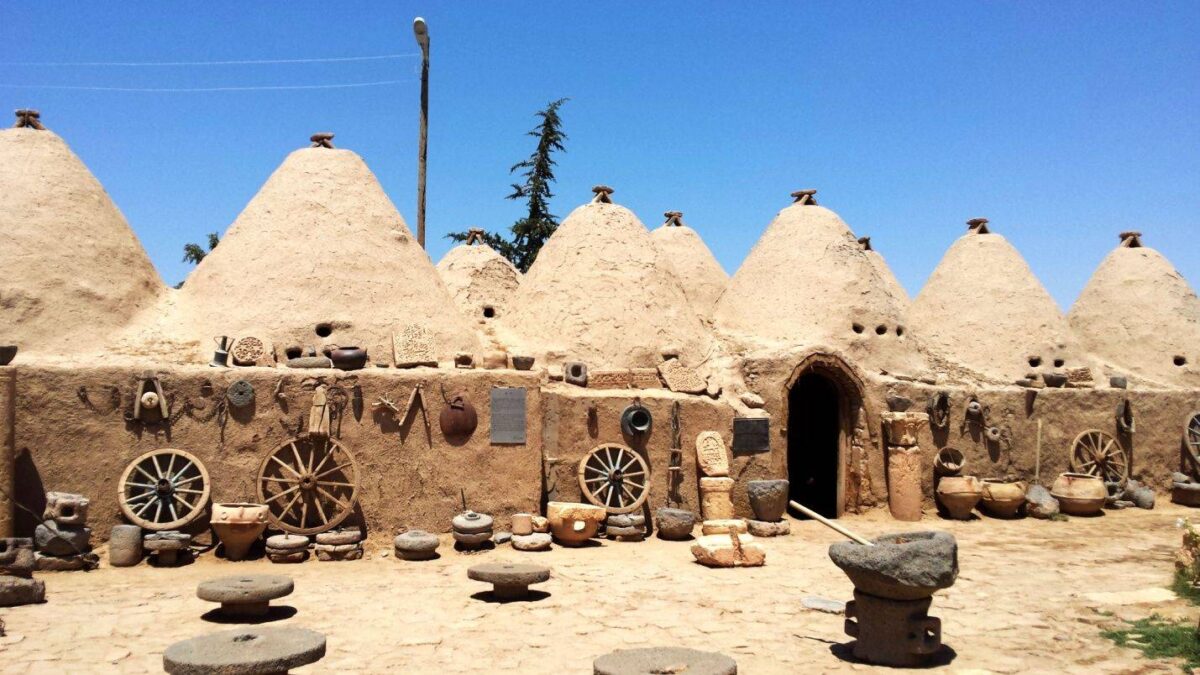 Ancient stone pillars of Göbekli Tepe under a protective roof in Eastern Turkey