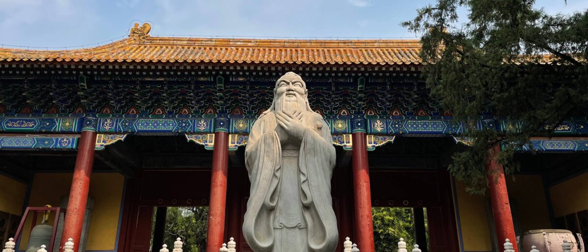 Colorful prayer flags and ornate rooftops at the Lama Temple in Beijing