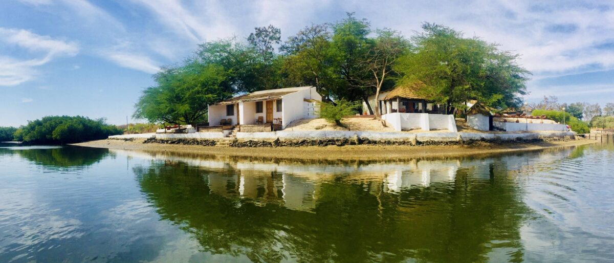 Eco-lodge with a swimming pool overlooking the mangrove and waterways of the Saloum Delta near Sokone
