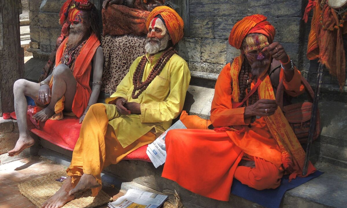 Evening scene in Kathmandu with a traditional restaurant lit up and guests enjoying Nepali cultural dance performances