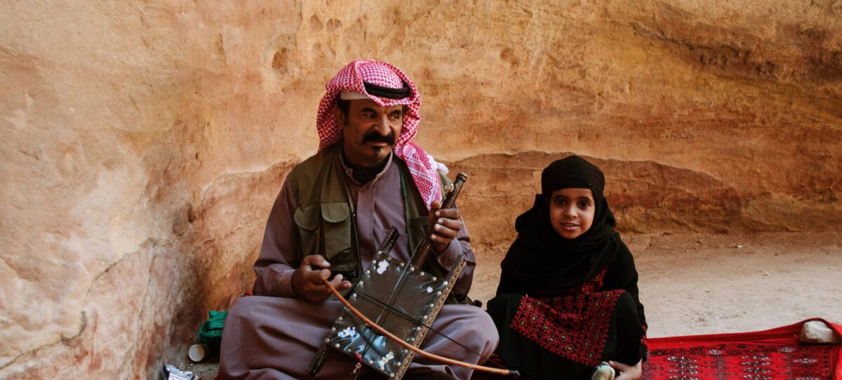 Evening view over the city of Amman with warm lights and historic buildings welcoming new arrivals