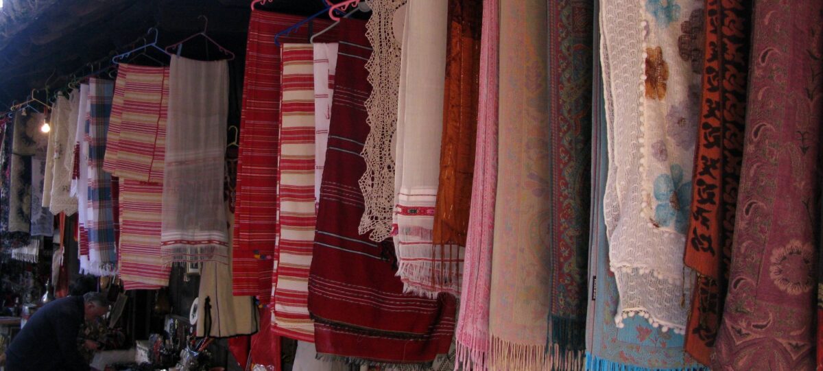 Historic center of Prizren with stone bridge, riverside mosque and fortress on the hill in Kosovo