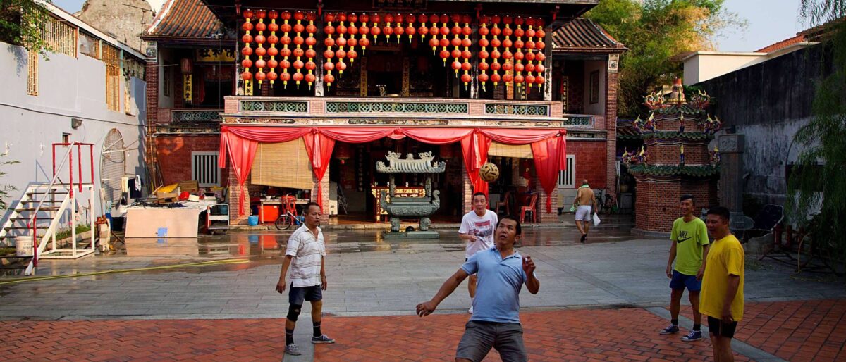 Historic street in George Town, Penang, with colourful colonial and Chinese shophouses