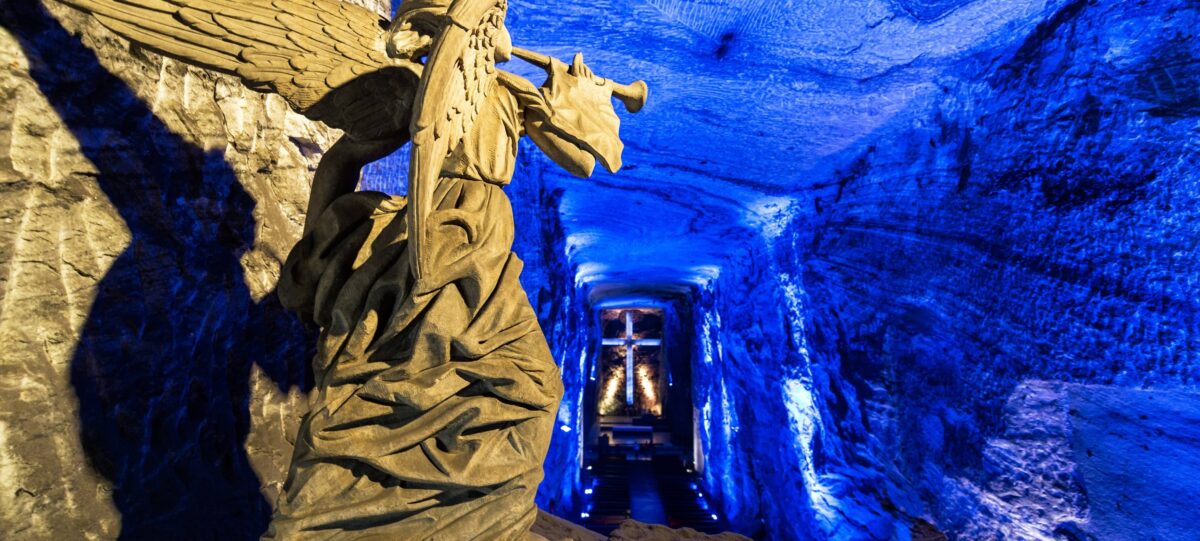 Illuminated underground nave of the Salt Cathedral of Zipaquirá carved into the rock