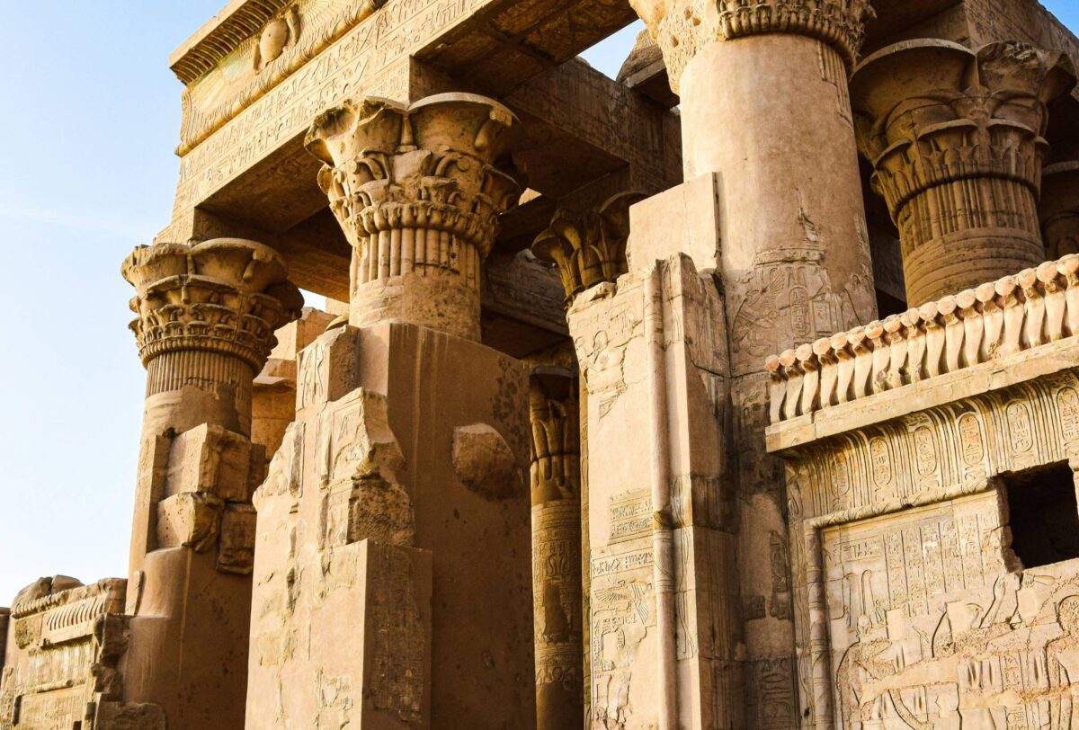 Kom Ombo Temple overlooking the Nile with twin colonnades and ancient reliefs at sunset