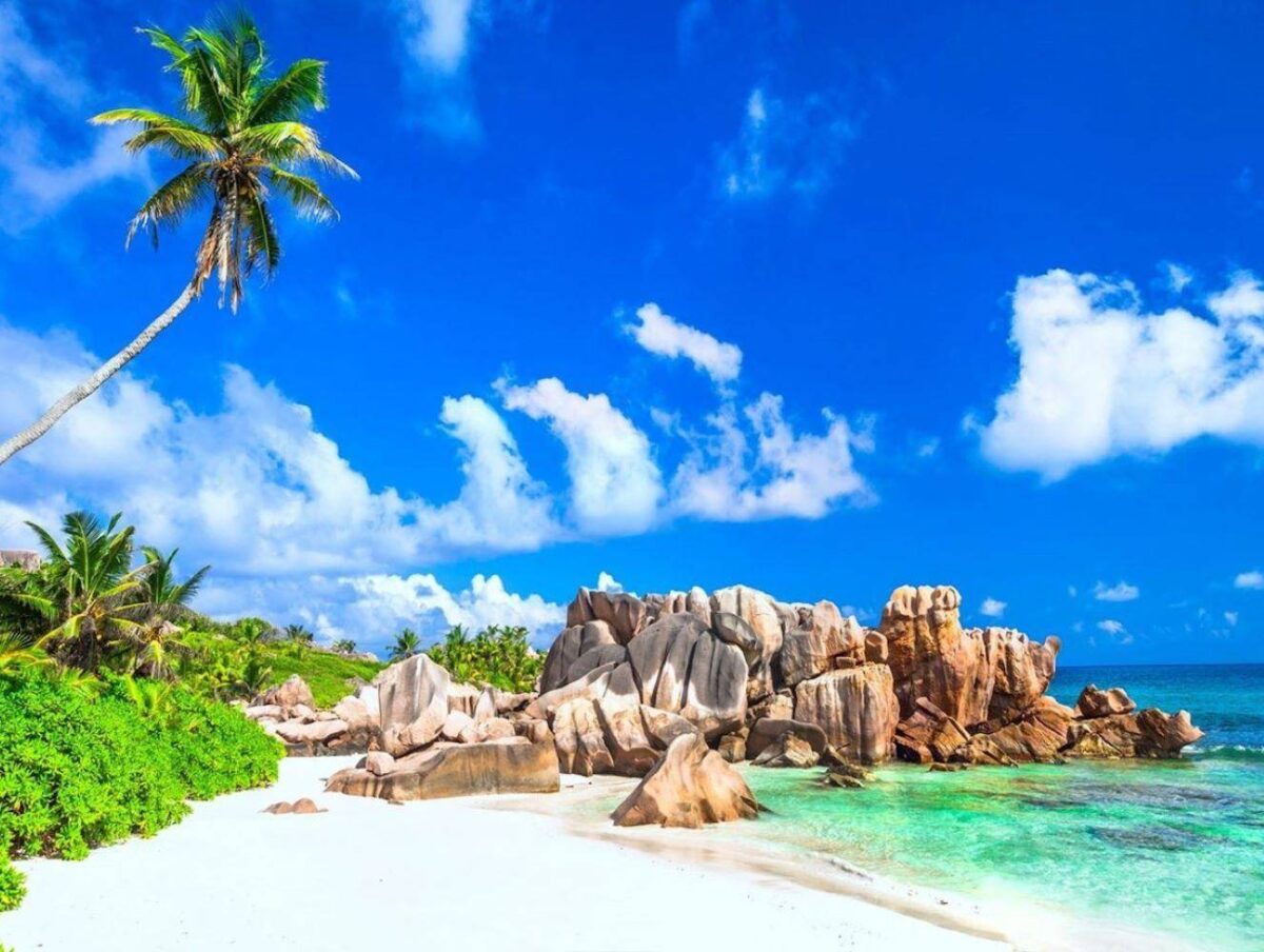 La Digue island beach with granite boulders, white sand and clear sea