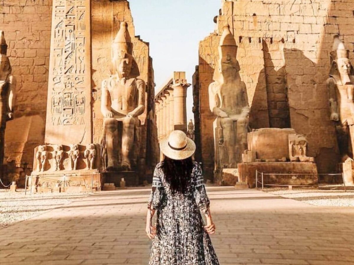Massive columns and hieroglyphs at Karnak Temple on the East Bank of Luxor