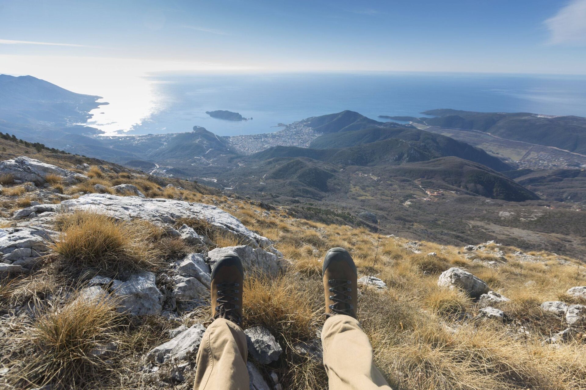Panoramic view of Albania’s mountains descending to the blue Ionian Sea along the Albanian Riviera on a sunny day