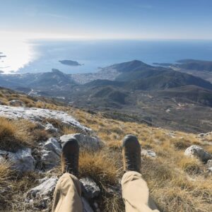 Panoramic view of Albania’s mountains descending to the blue Ionian Sea along the Albanian Riviera on a sunny day