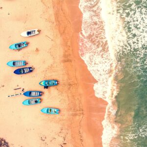 Panoramic view of Sri Lanka’s Sigiriya rock fortress rising above the surrounding jungle under a clear blue sky