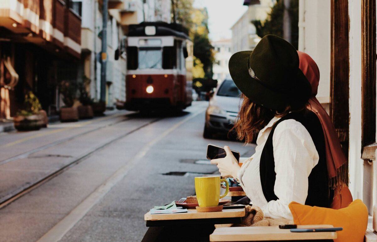 Passenger boat cruising the Bosphorus at sunset with Istanbul’s skyline in the background