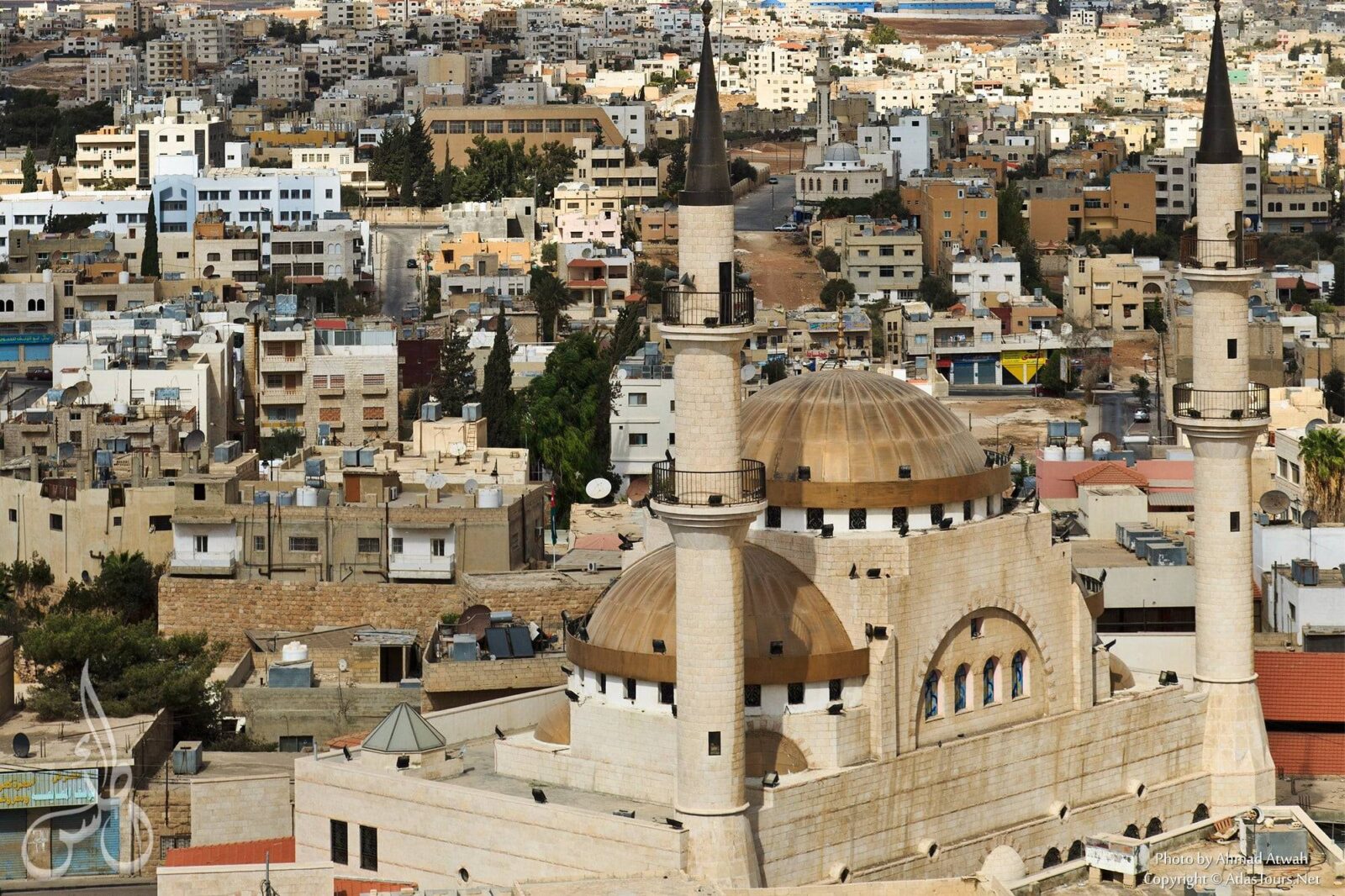 Historic church interior in Madaba with colorful floor mosaics