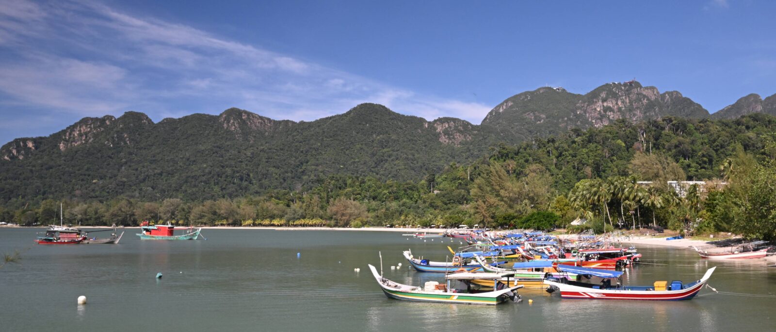 Aerial view of Langkawi Island with green hills, sandy beaches and turquoise sea