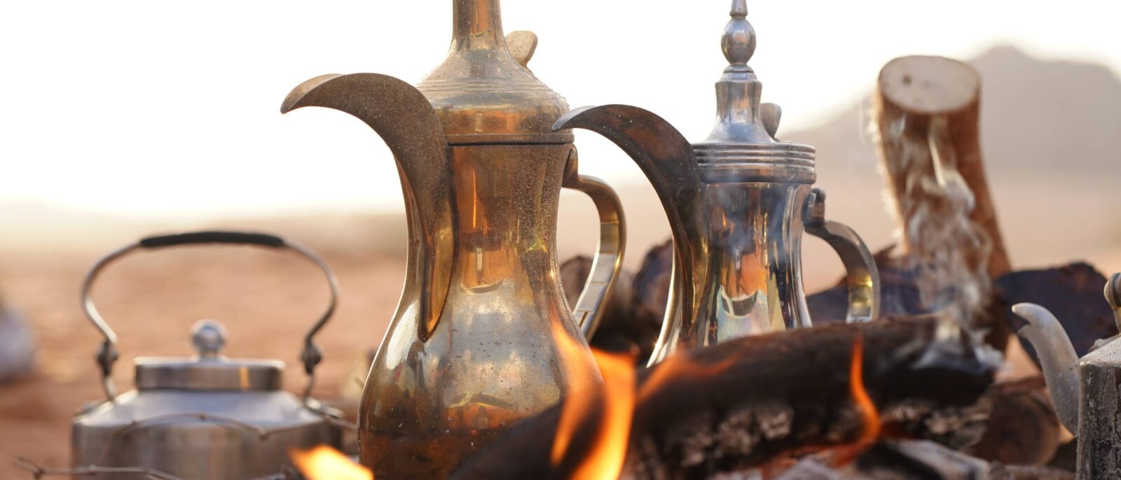 Sultan Qaboos Grand Mosque in Muscat with its grand dome and minarets under a clear blue sky