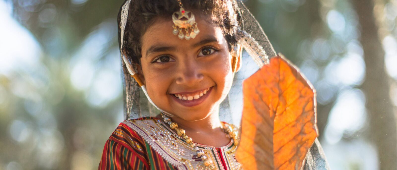 View of Shangri-La Al Waha resort near Muscat, Oman, with pools, palm trees and the sea