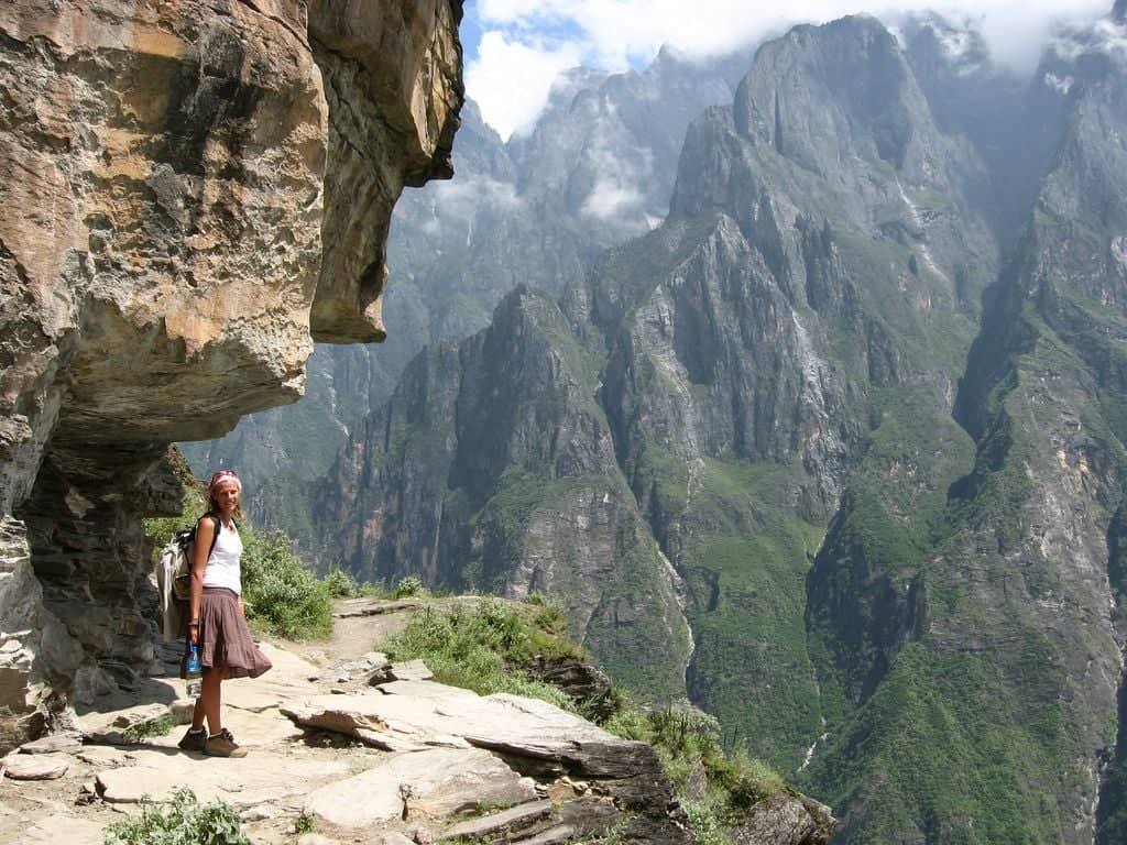 View of Shangri-La (Zhongdian) with traditional Tibetan-style houses and a large monastery on a hillside