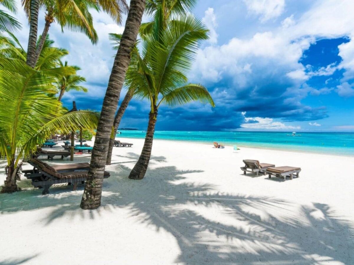 Quiet beach at Belle Mare on Mauritius’ east coast with white sand and calm turquoise sea