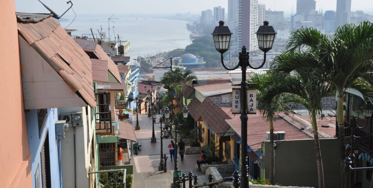 Skyline of Guayaquil with modern high-rises and the Guayas River promenade at sunset