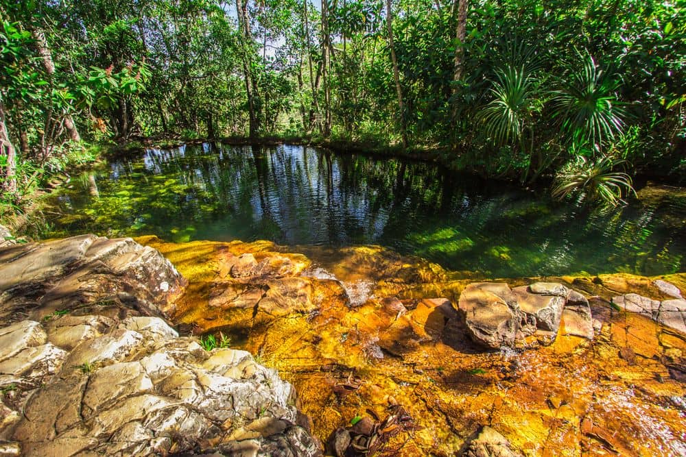 Sunlight shining into the intense blue waters of Poço Azul cave pool in Chapada Diamantina, Brazil