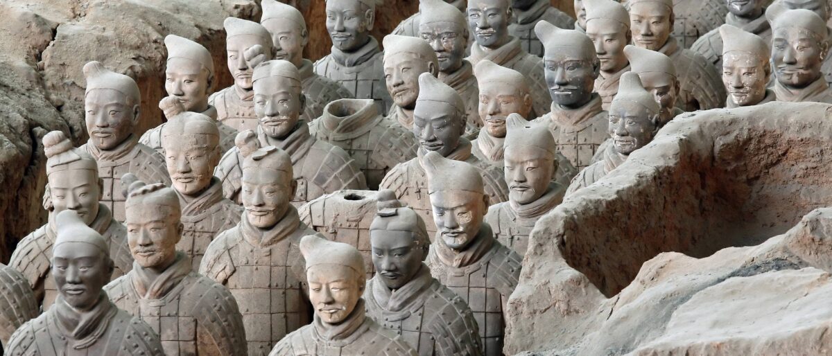 Terracotta Army in Xi'an with rows of life-sized clay soldiers in an excavation hall