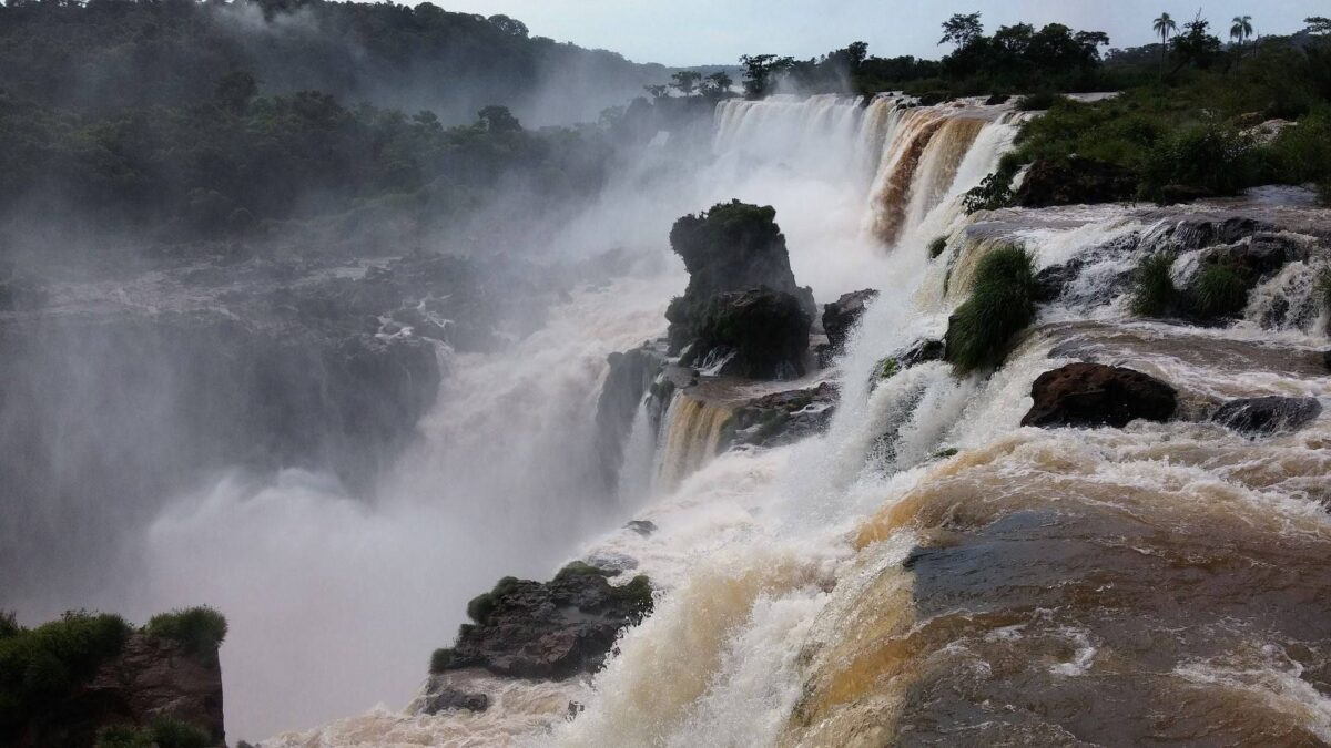 View from a walkway looking into the misty chasm of Devil’s Throat at Iguazu Falls