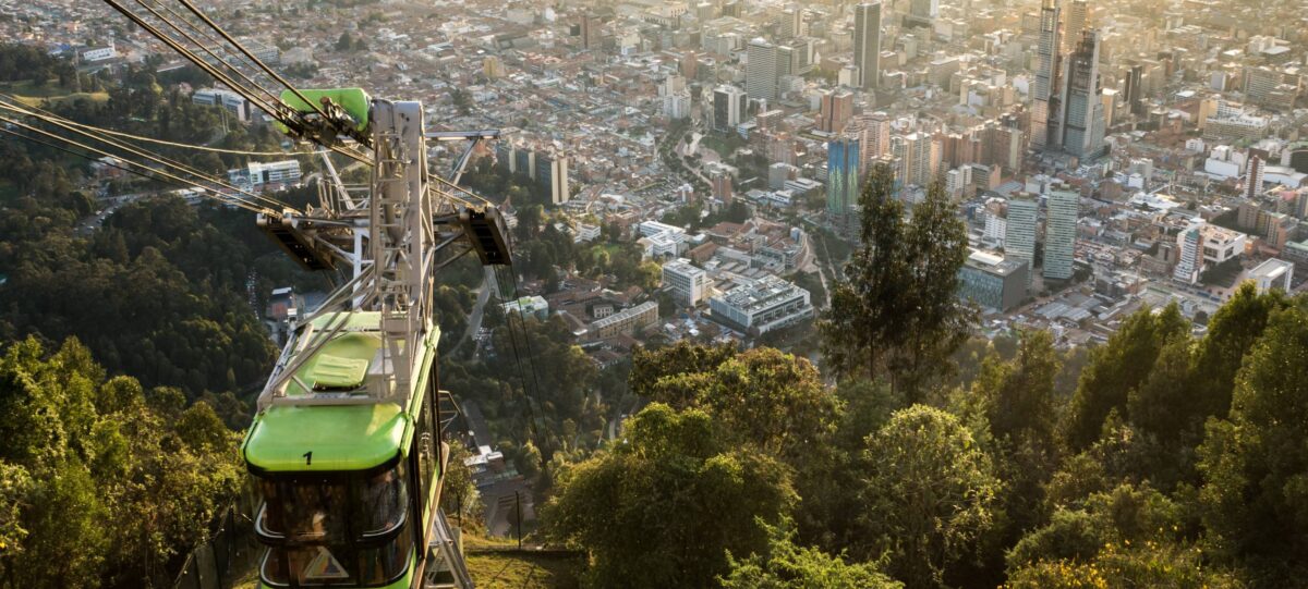 View from Cerro Monserrate over Bogotá’s skyline and surrounding mountains on a clear day