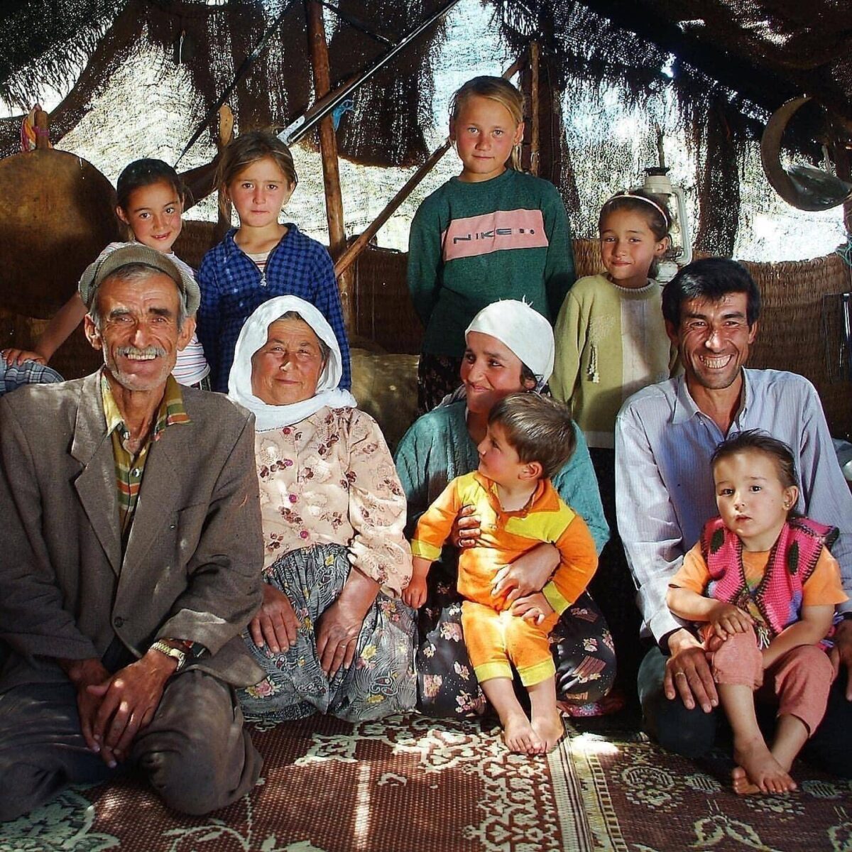 View of an airplane on the tarmac at Dalaman Airport under a clear sky in Turkey