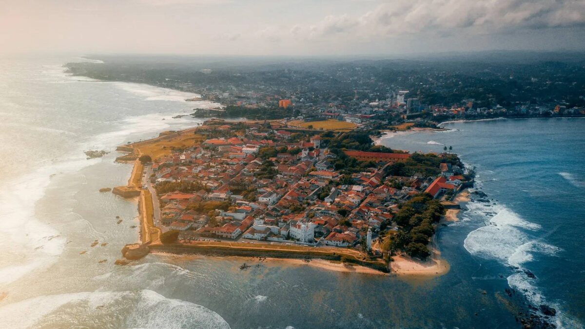 View of the colonial lighthouse and ramparts of Galle Fort overlooking the Indian Ocean in southern Sri Lanka
