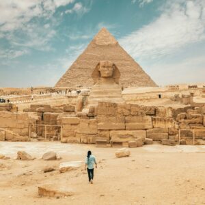 View of the Pyramids of Giza and the Sphinx near Cairo under a clear blue sky