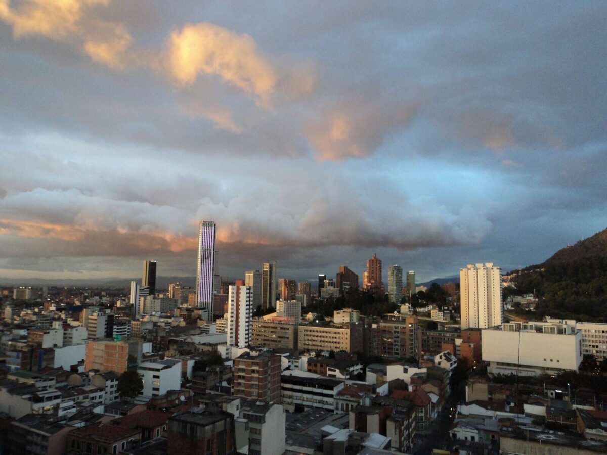 View over Bogotá’s historic center La Candelaria with colorful colonial houses and mountains in the background