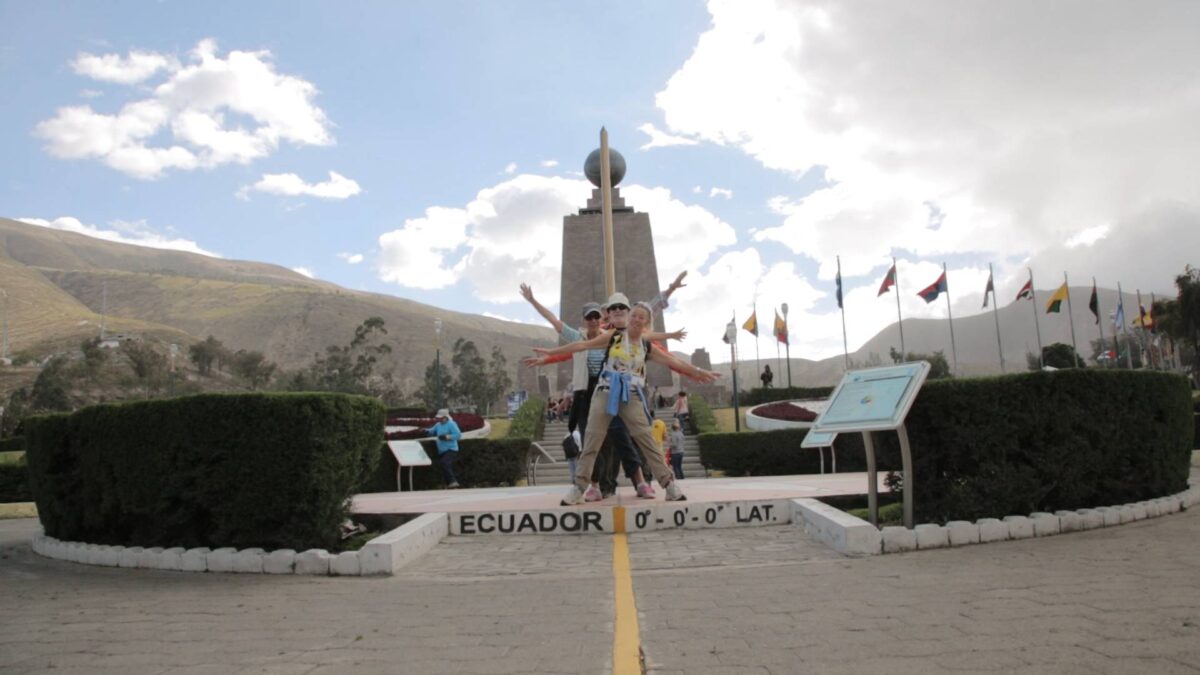 View over Quito’s colonial old town with church towers and surrounding Andean mountains under a clear sky